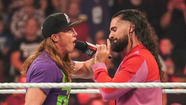 Matt Riddle and Seth Rollins confront each other in the ring